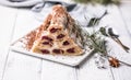 ÃÂ¡ake monastery hut on white plate. Christmas dessert